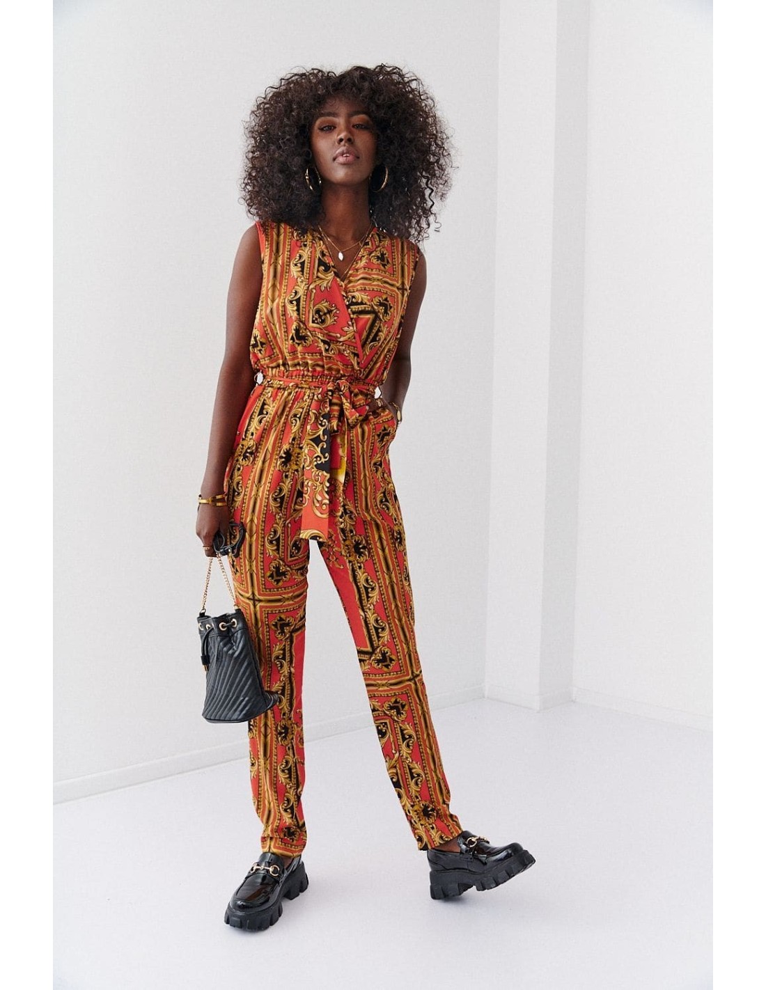 Patterned jumpsuit with envelope neckline, orange and mustard 70000 - Online store - Boutique